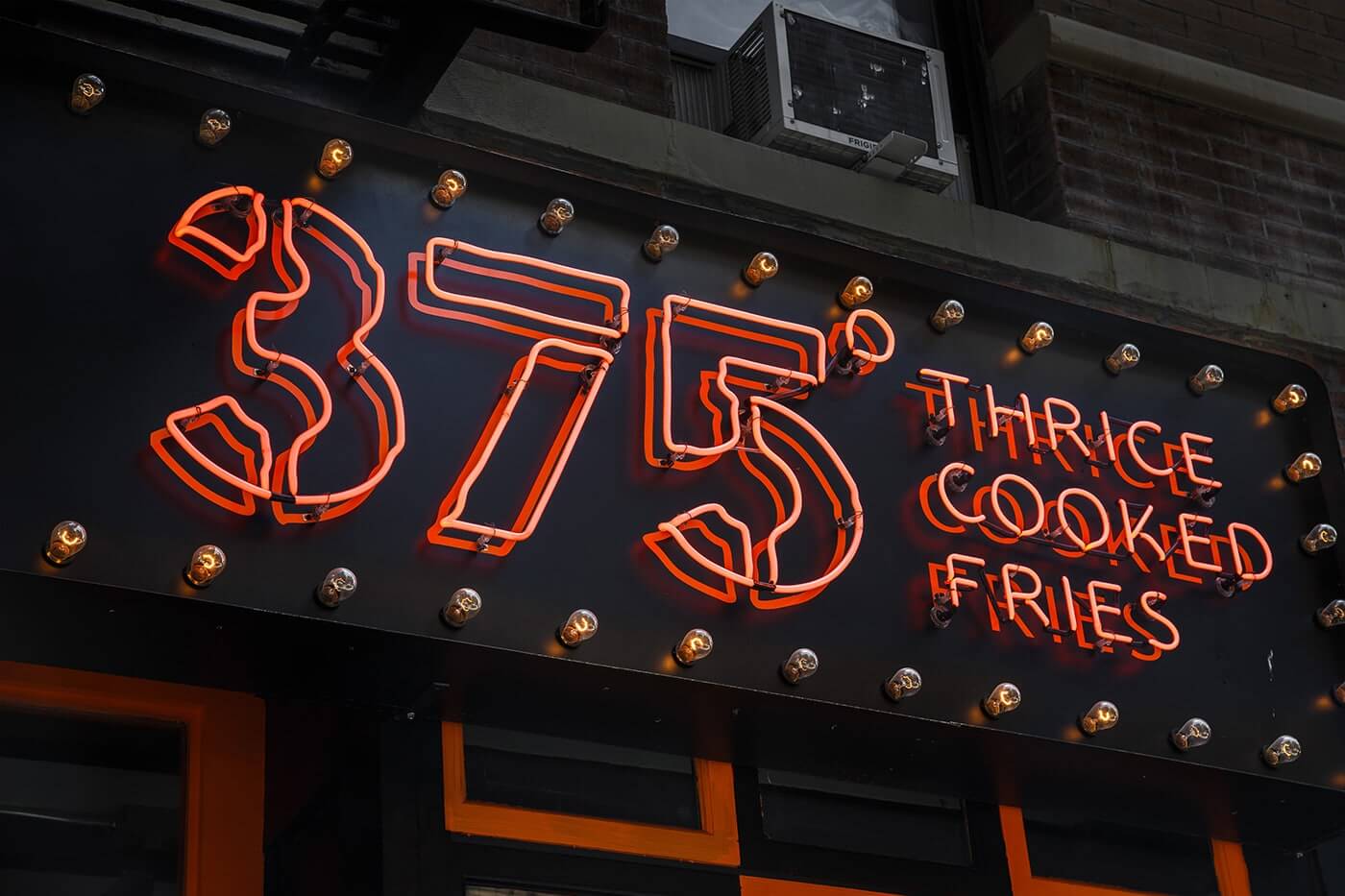 Store signage neon sign in New York for food and beverage brand 375 Chicken and Fries