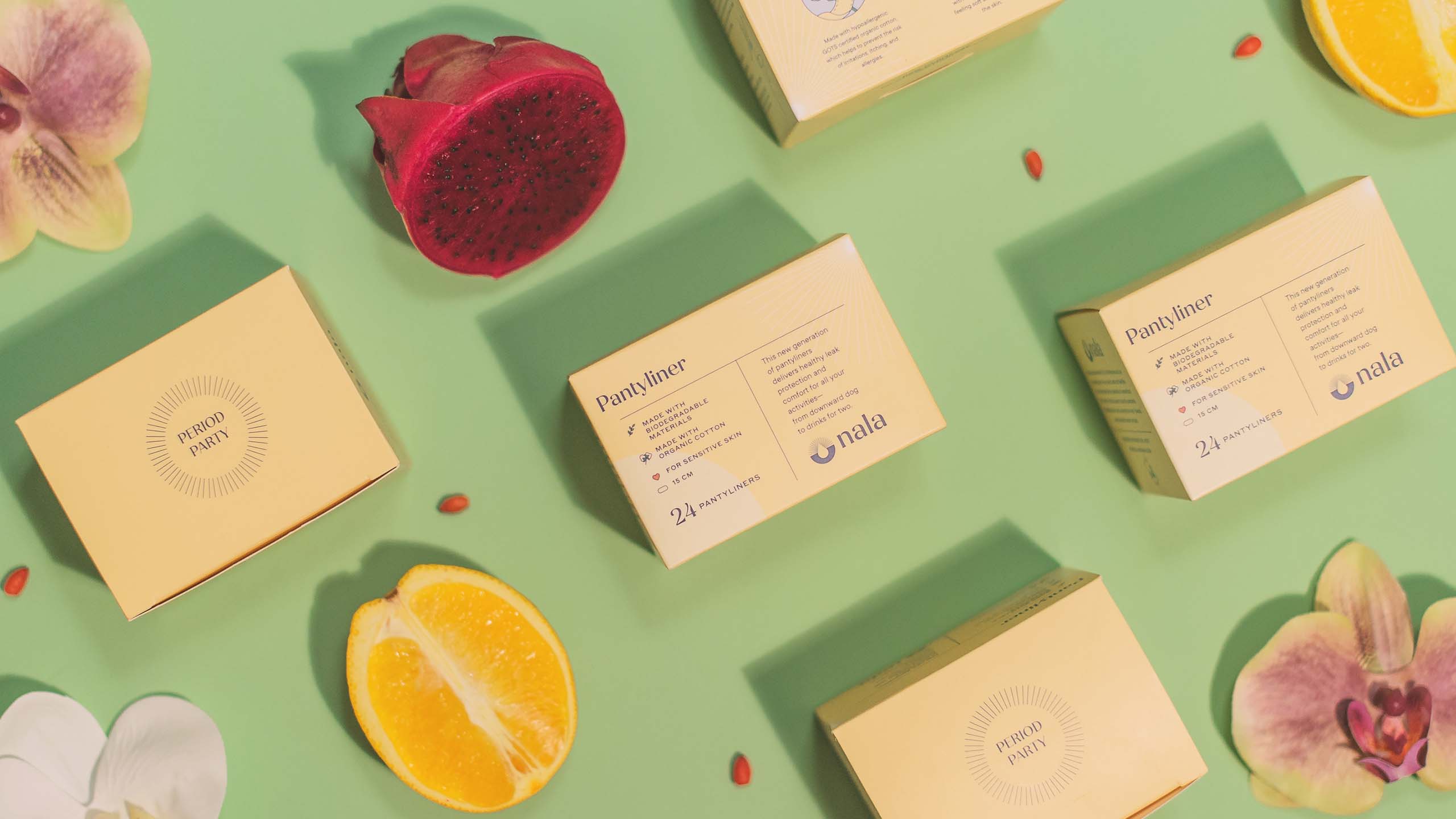 Flatlay photography of sustainable sanitary products and fruits for femtech brand Nala
