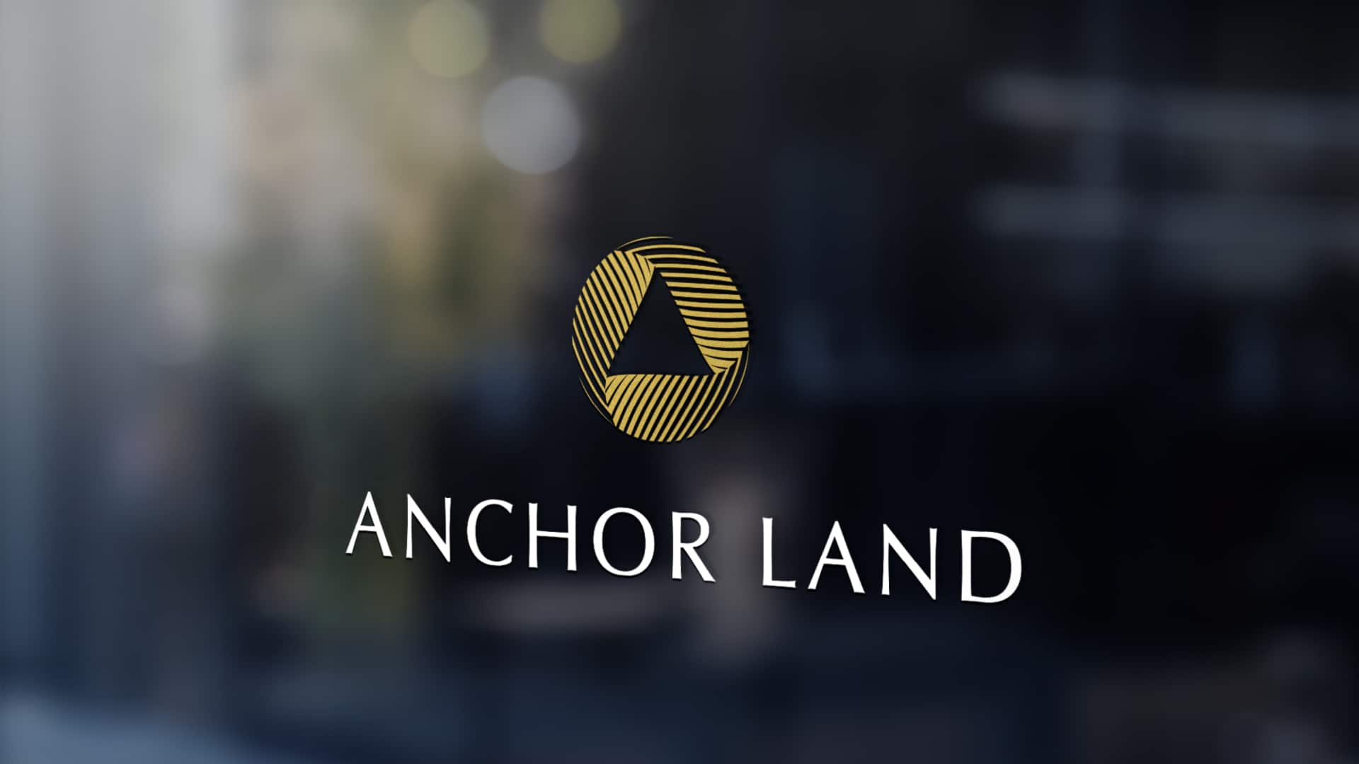 Gold foil window decal and logo design for property developer brand Anchor Land