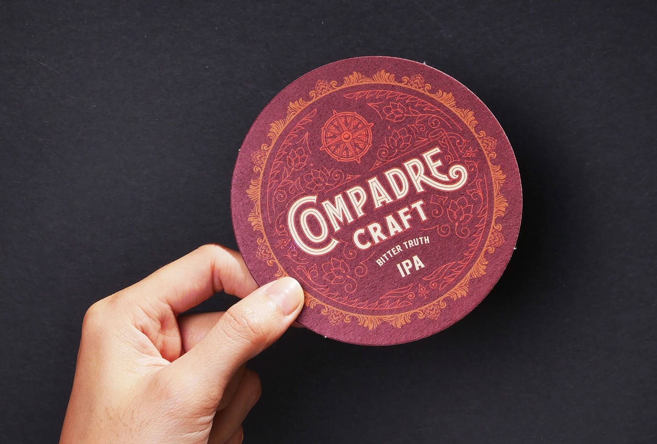 Vintage coaster design and logo for food and beverage brand Compadre Craft Beer