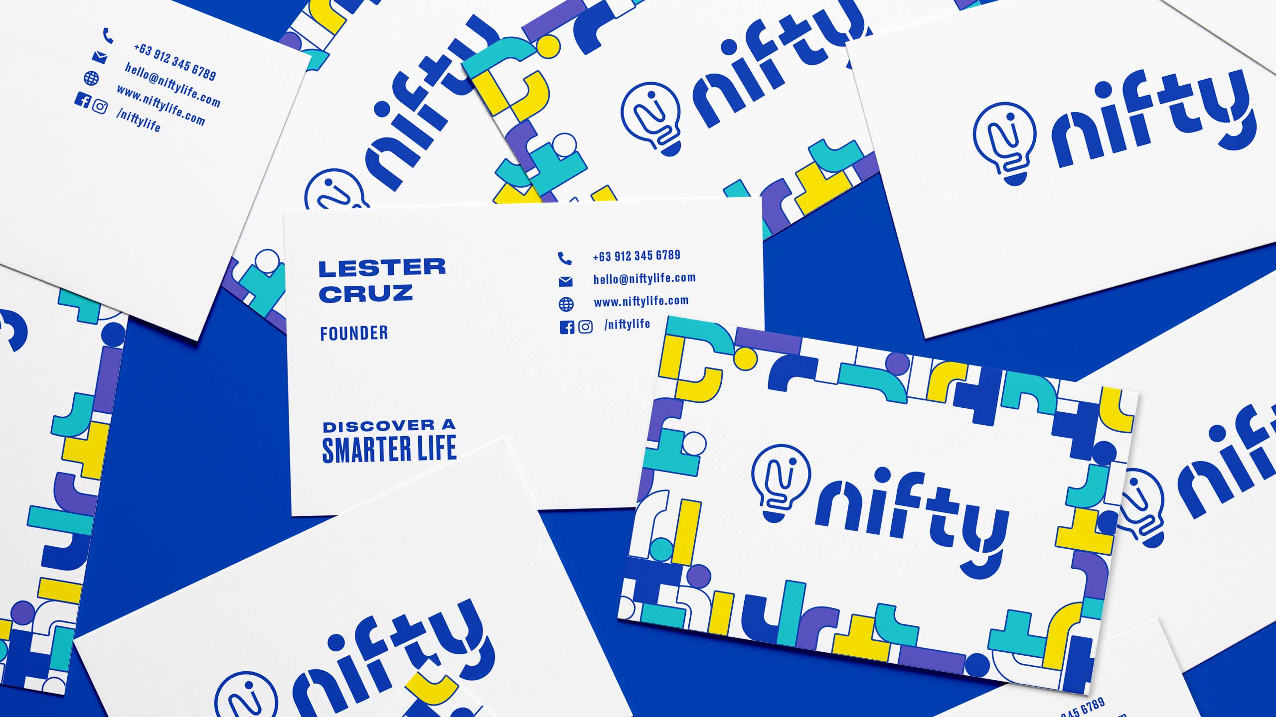 A flatlay of business cards designed Business collaterals and geometric brand pattern for retail tech brand Nifty