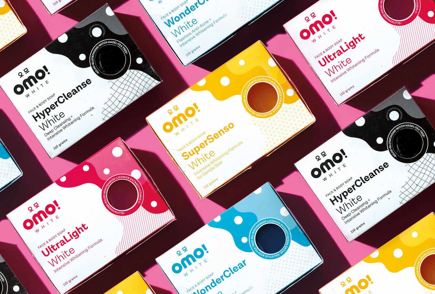 A flat lay of cute and fun soap box packaging designs for beauty and skincare brand Omo! White
