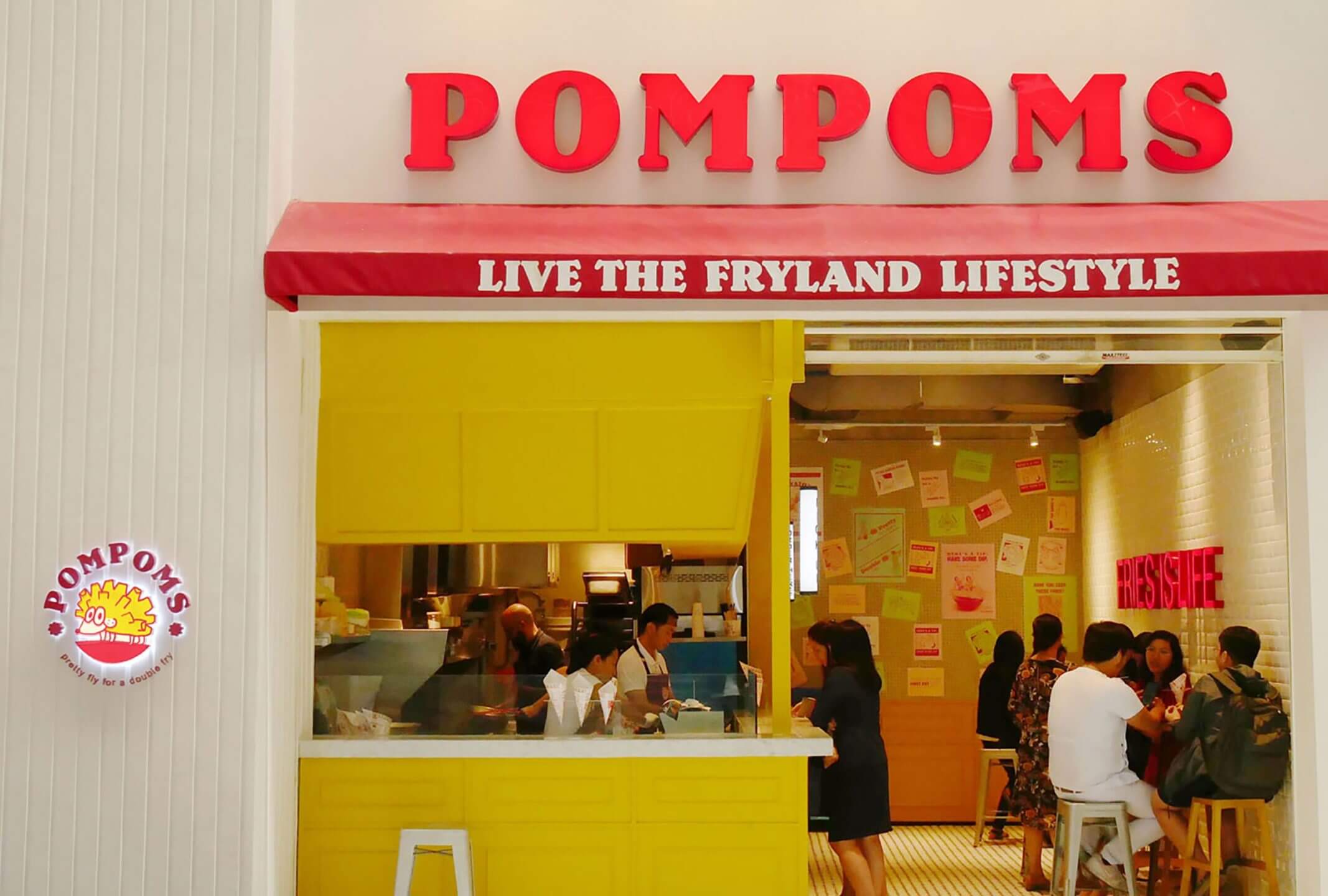Store front, poster wall, and environment design for food and beverage brand Pompoms