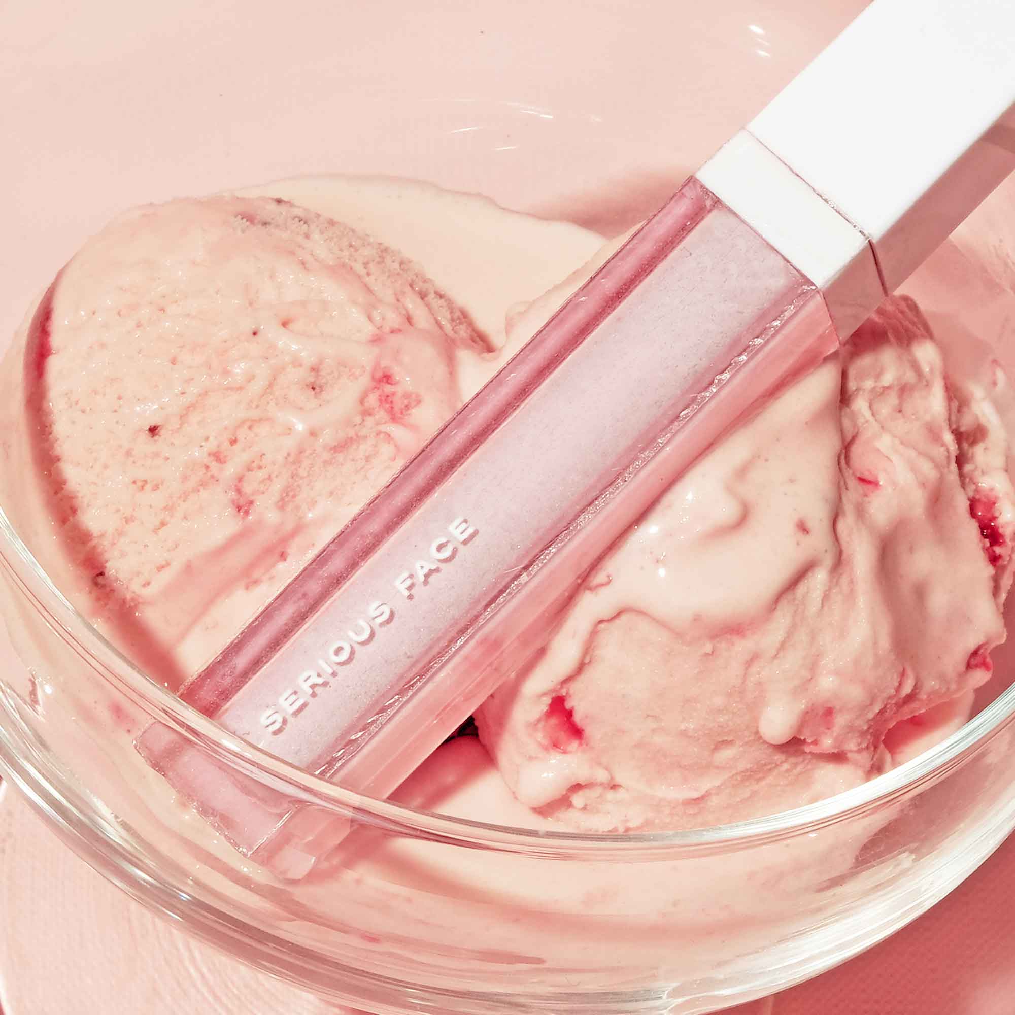 A photo of Serious Face's pink lipstick or beauty stick in a bowl of ice cream