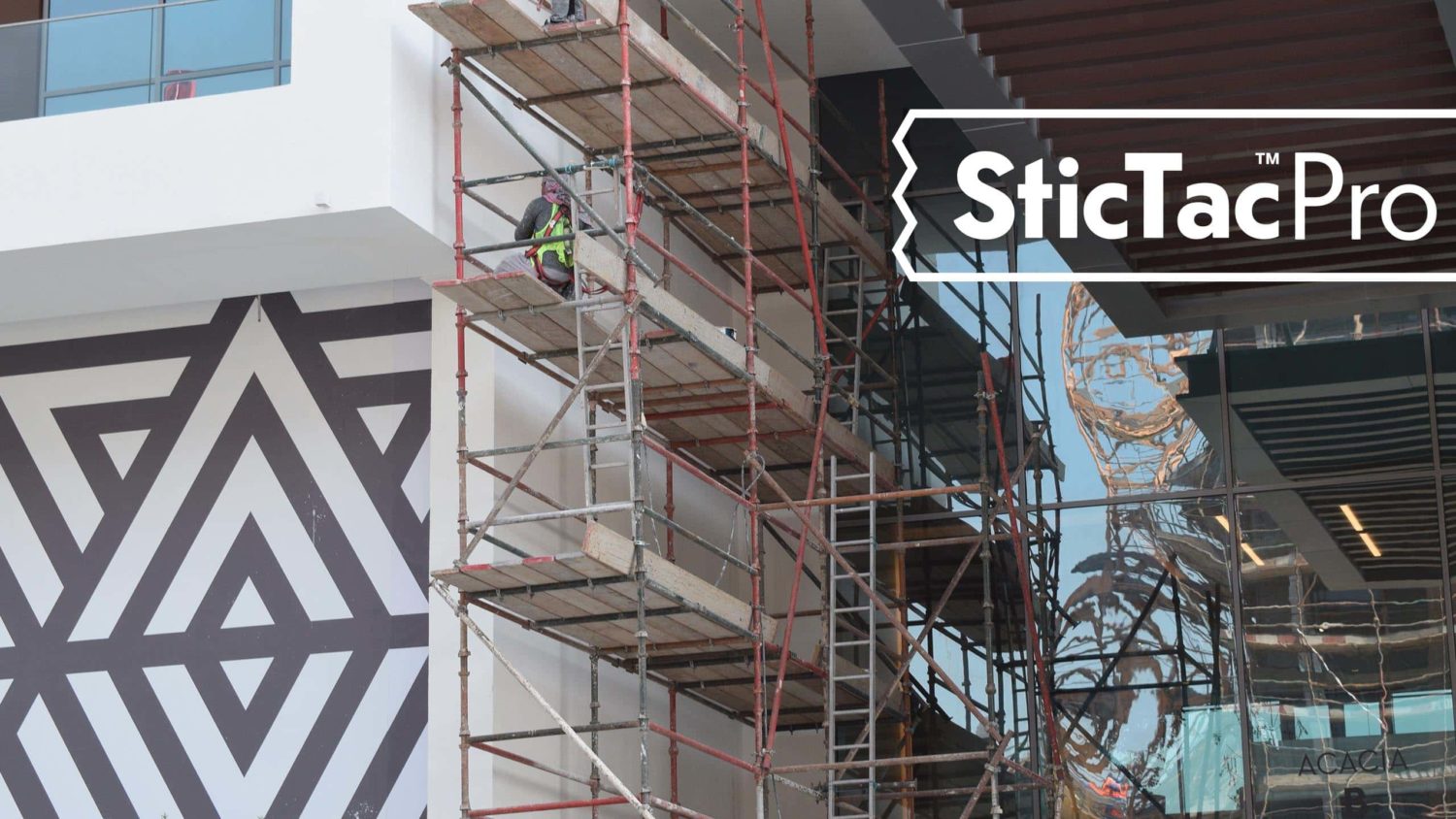 Photo of construction site with SticTac Pro logo