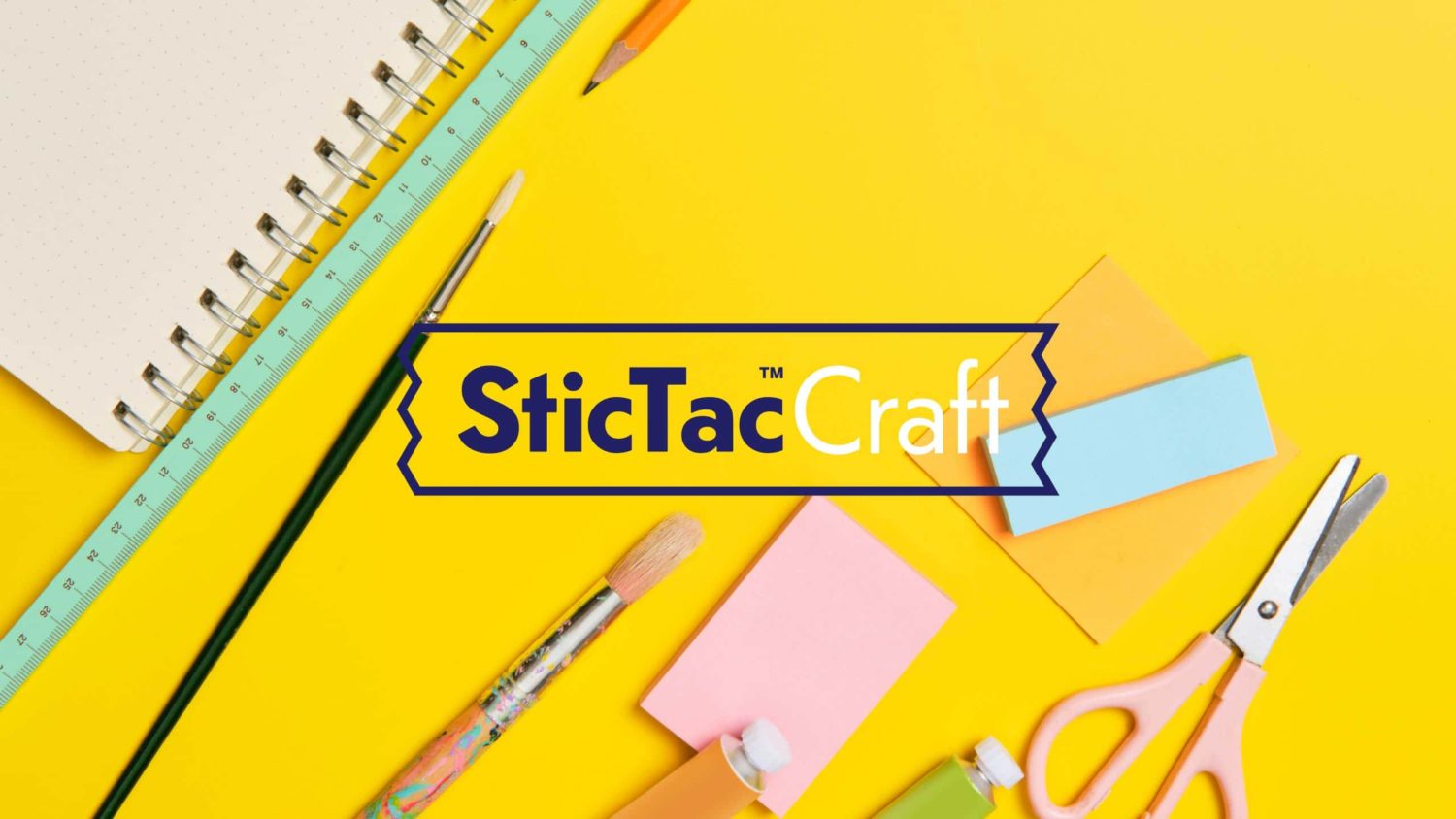 The SticTac Craft logo on a flatlay of craft supplies